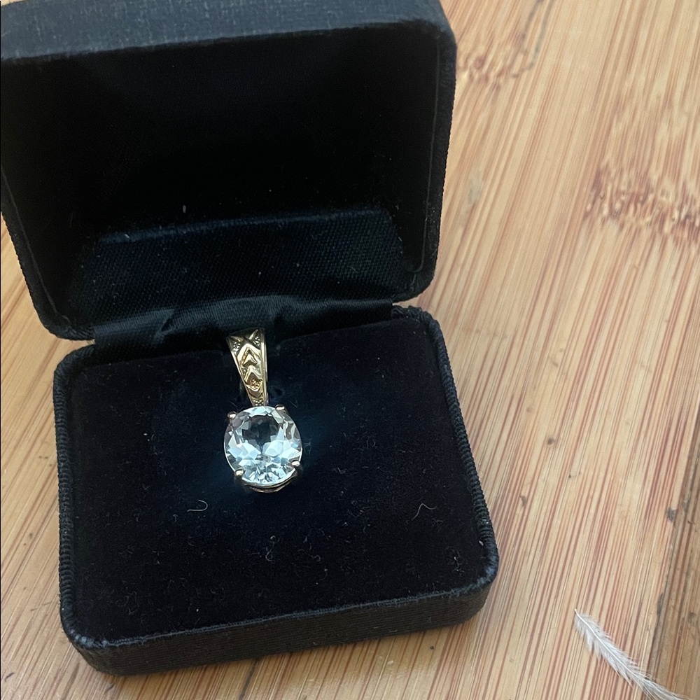 Elegant Gold and clear quartz Pendant